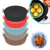 A set of Martify AirFryerMate, the Eco-Friendly Silicone Grill Tray Protectors, showcasing a chicken in the center.
