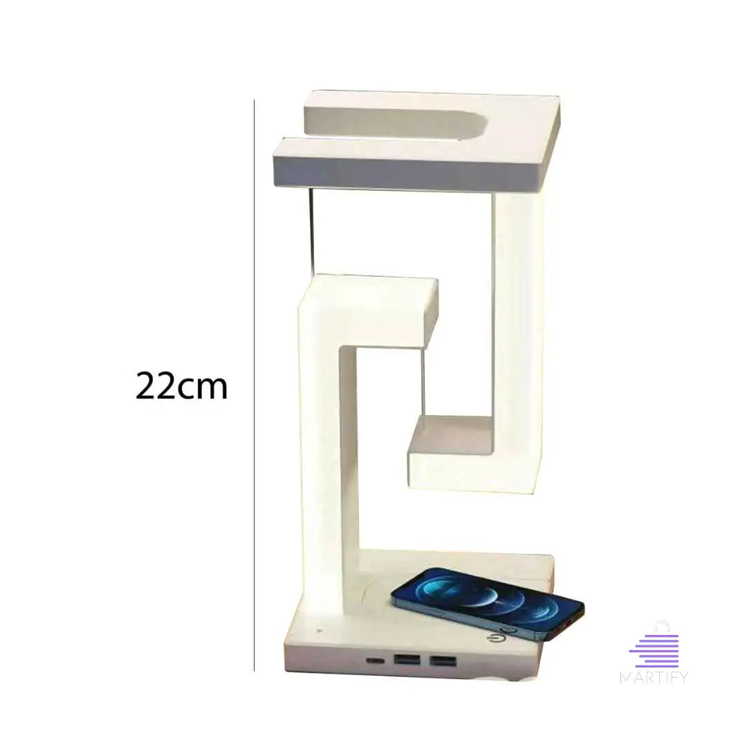 22cm height of Levitateglow from Martify White desk lamp with cell phone on it