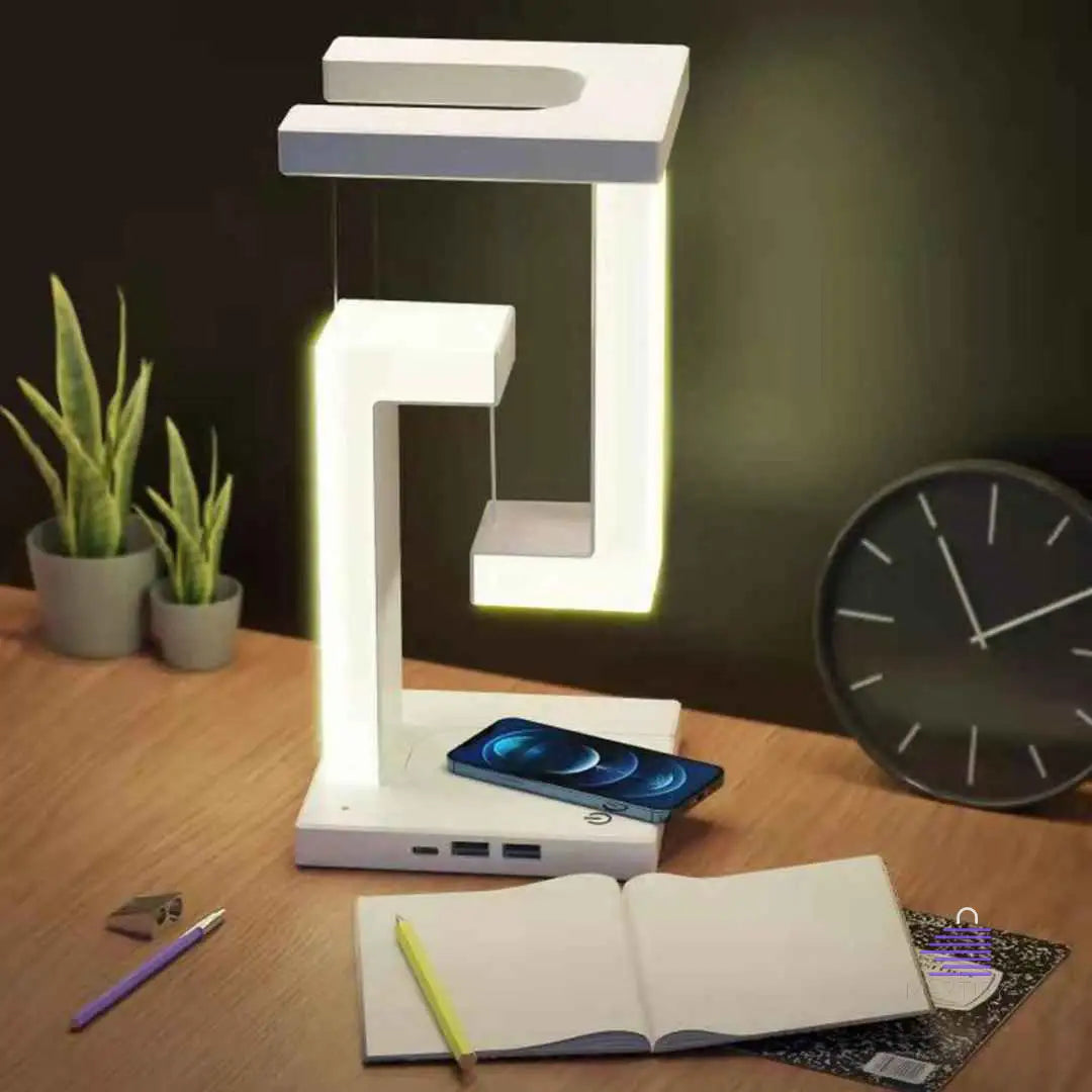 A Martify LED desk lamp with a cell phone on it.