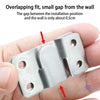 A person is holding a Martify WallArtMate with a small gap between it and the wall.